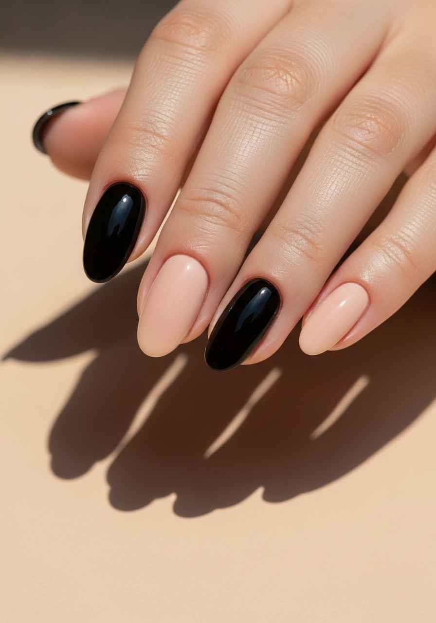 Black Nail Polish with Nude Accent Nail