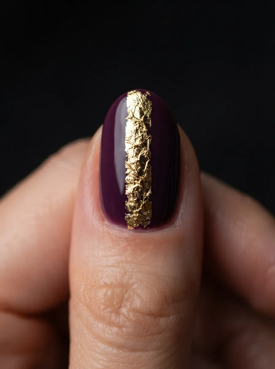 Gold Foil Accent Stripe on Plum Nails